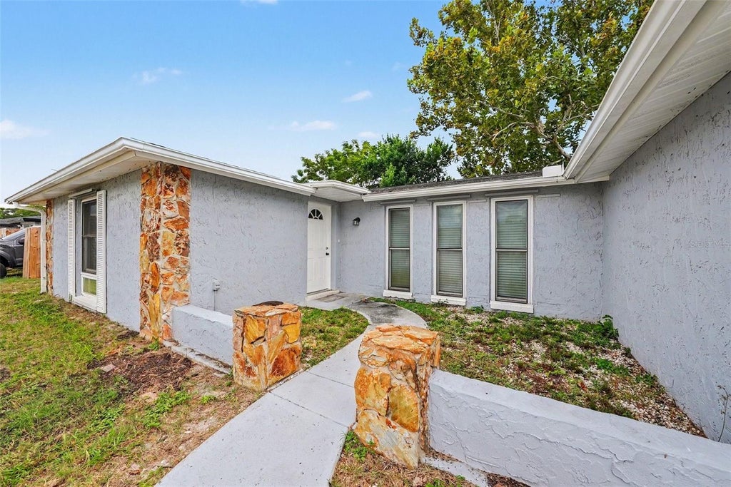Photo of 7820 Birchwood Drive, Port Richey, FL 34668 (MLS # O6446562)