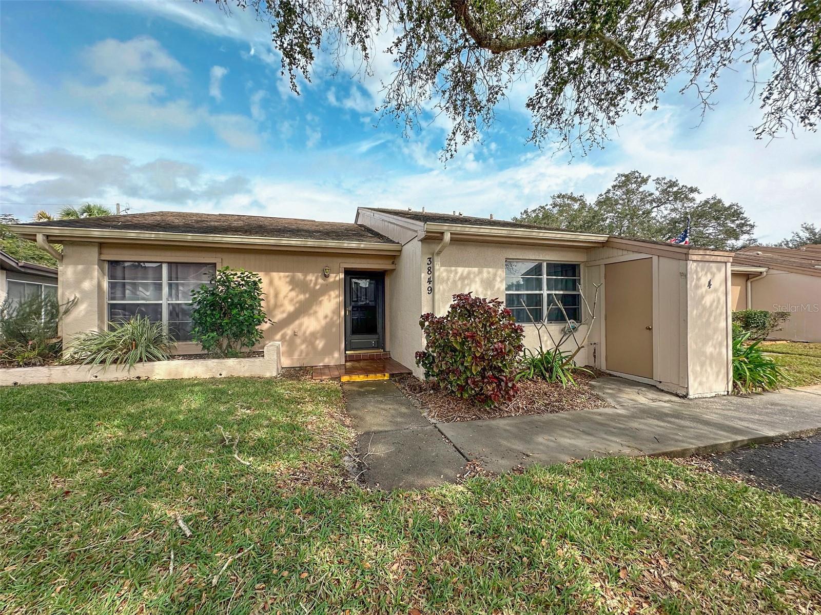 Why pay rent when you can own? Move right into this beautifully renovated 2-bedroom, 2-bath end-unit condo in the highly desirable 55+ Holiday Lake Villas community. This first-floor unit has been fully updated with brand-new top-of-the-line appliances, A/C, water heater, ceramic tile, tall cabinets with granite counters, and a stunning backsplash. Modern colors, crown molding, and baseboards create a fresh, luxury feel throughout. Both bathrooms have been redesigned with spacious layouts, custom tile, and glass showers. Enjoy the convenience of a private laundry room with new washer & dryer, plus a screened lanai with tile flooring and extra storage. The association provides peace of mind with full exterior maintenance, including roof replacement when needed and outside painting. Your monthly HOA fee conveniently covers water, high-speed internet, and TV service, ensuring both value and worry-free living.
The community offers fantastic amenities including a pool, clubhouse, exercise room, restaurant, bar, and planned activities every month—just steps from your door. Association takes care of exterior maintenance and more. Located minutes from beaches, boat launches, shopping, and dining, this move-in ready condo is perfect for seasonal living, downsizing, or as a smart investment.
Schedule your private showing today—this one won’t last!