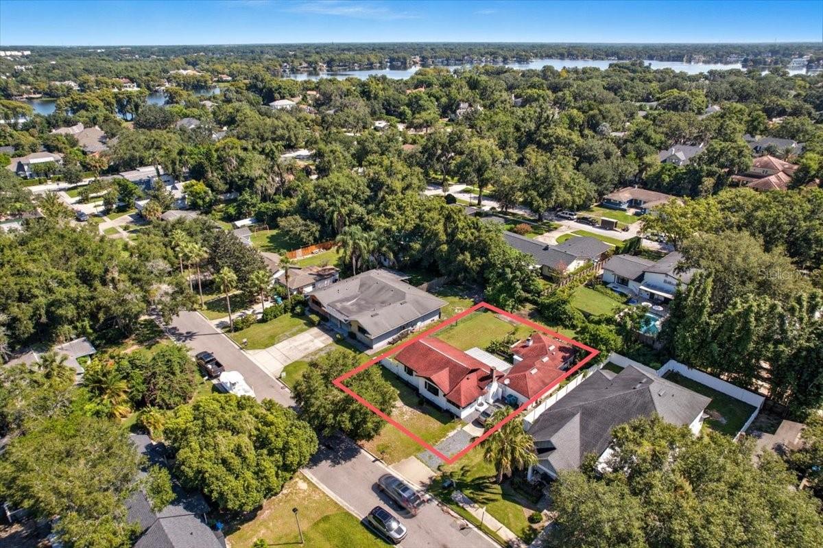 Build Your Dream Home in Prime Maitland Location! A rare opportunity awaits at 1550 Ridgewood Avenue — located just steps from the Enzian Theater, Park Maitland School, and minutes from Whole Foods Market. Zoned for highly sought-after Dommerich Elementary, Maitland Middle, and Winter Park High School, this property offers the perfect foundation for your next custom build. With a lot size of 77' x 111' (and the potential to extend to 77' x 136'), this site provides flexibility and vision. Collect rental income from the existing home as you plan your future project. Whether you envision a luxury single-family residence or a high-end duplex, the possibilities are endless. This property is also listed as a pre-construction opportunity, with a preferred builder and architect already designing a one-of-a-kind custom home concept tailored for this parcel. Don’t miss the chance to create something exceptional in one of Central Florida’s most desirable locations.