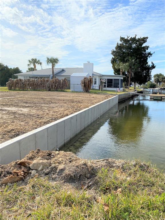 Come Build your Dream home in Paradise !! Beautiful Waterfront Corner Lot with Direct Gulf Access located in Popular Hernando Beach. Within minutes of leaving your backyard, you can be out in open water. But still close to restaurants shopping and all conveniences. Property has been Cleared, Surveyed, and a new Seawall in 2021. Don't Miss Out !!! Owner financing is Available.