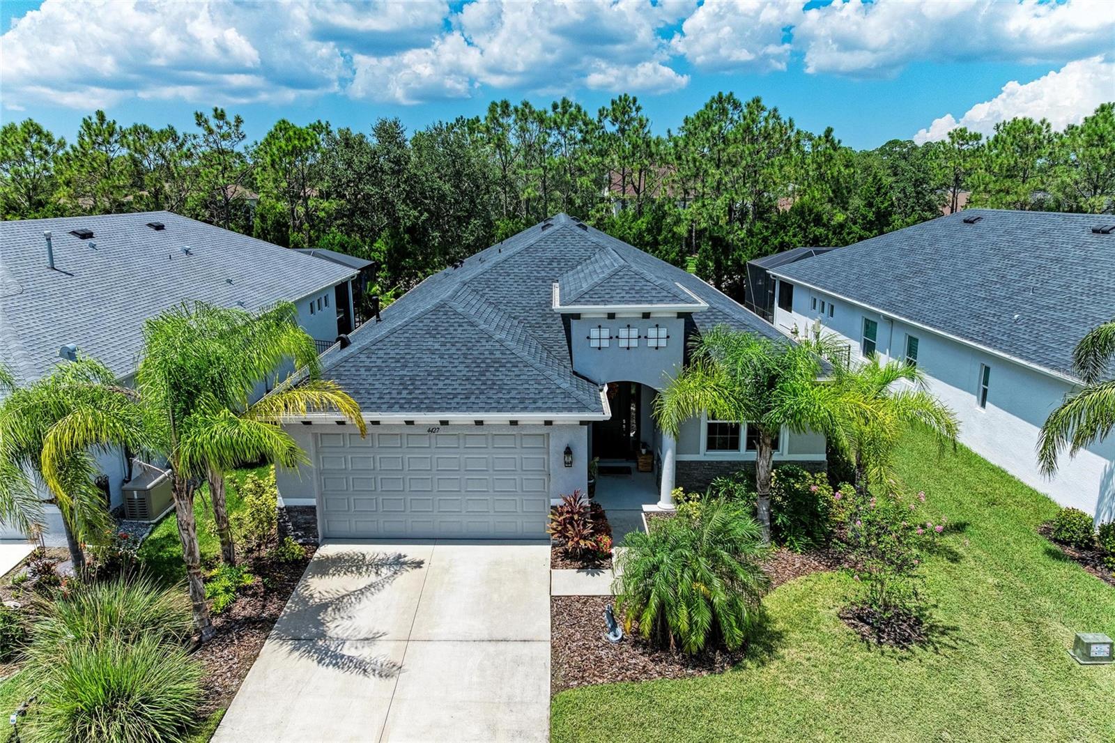 Discover your dream home in the picturesque community of Cross Creek in Parrish, Florida. This beautiful single-level home is eagerly waiting for its new owners. Experience the perfect blend of comfort, style, and luxury in this exquisite 3-bedroom, 2-bathroom residence that also features an oversized den/office—ideal for a spacious home office for two.
Exceptional Features Crafted by Medallion Homes, this property offers unparalleled comfort and style. Enjoy the extended lanai and the added square footage of the gas-heated, saltwater pool, perfect for entertaining or simply unwinding in the privacy of your own backyard. The gourmet kitchen is a chef's delight, boasting gleaming Quartz countertops, a natural gas cooktop, and sleek stainless-steel appliances that make cooking an absolute pleasure. Quartz countertops, natural gas cooktop, stainless-steel appliances. Primary Retreat: Spacious bedroom, spa-like bathroom with double sinks and a walk-in shower. Guest Accommodation: Two generously sized guest bedrooms that share the second bath. Oversized laundry room with a sink and extra storage space. The home is equipped with a gas water heater for rapid hot water and impact glass windows throughout, the home wired for whole home surround sound, and the lanai has electric, water and gas for a future outdoor kitchen.
Prime Location; Nestled in the Cross Creek community, this home is in a prime location just 2 miles north of the Ft. Hamer Bridge. Enjoy access to fantastic community amenities, including a refreshing community pool, a playground for the little ones, a basketball court, and a dog park for your furry friends.
Located centrally between St. Petersburg, Sarasota, Lakewood Ranch, and Tampa, this home offers easy access to local beaches and all the new shopping and restaurants that are popping up in Parrish. Whether you’re seeking relaxation on the sandy shores or the vibrant energy of city life, this location has it all.
Don't miss out on this special home! Make an appointment soon before this one gets away!