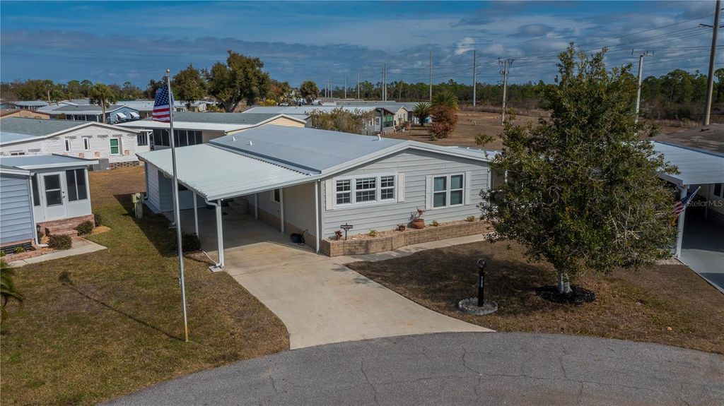 Photo of 720 Butterfield Circle, Englewood, FL 34223 (MLS # C7522121)