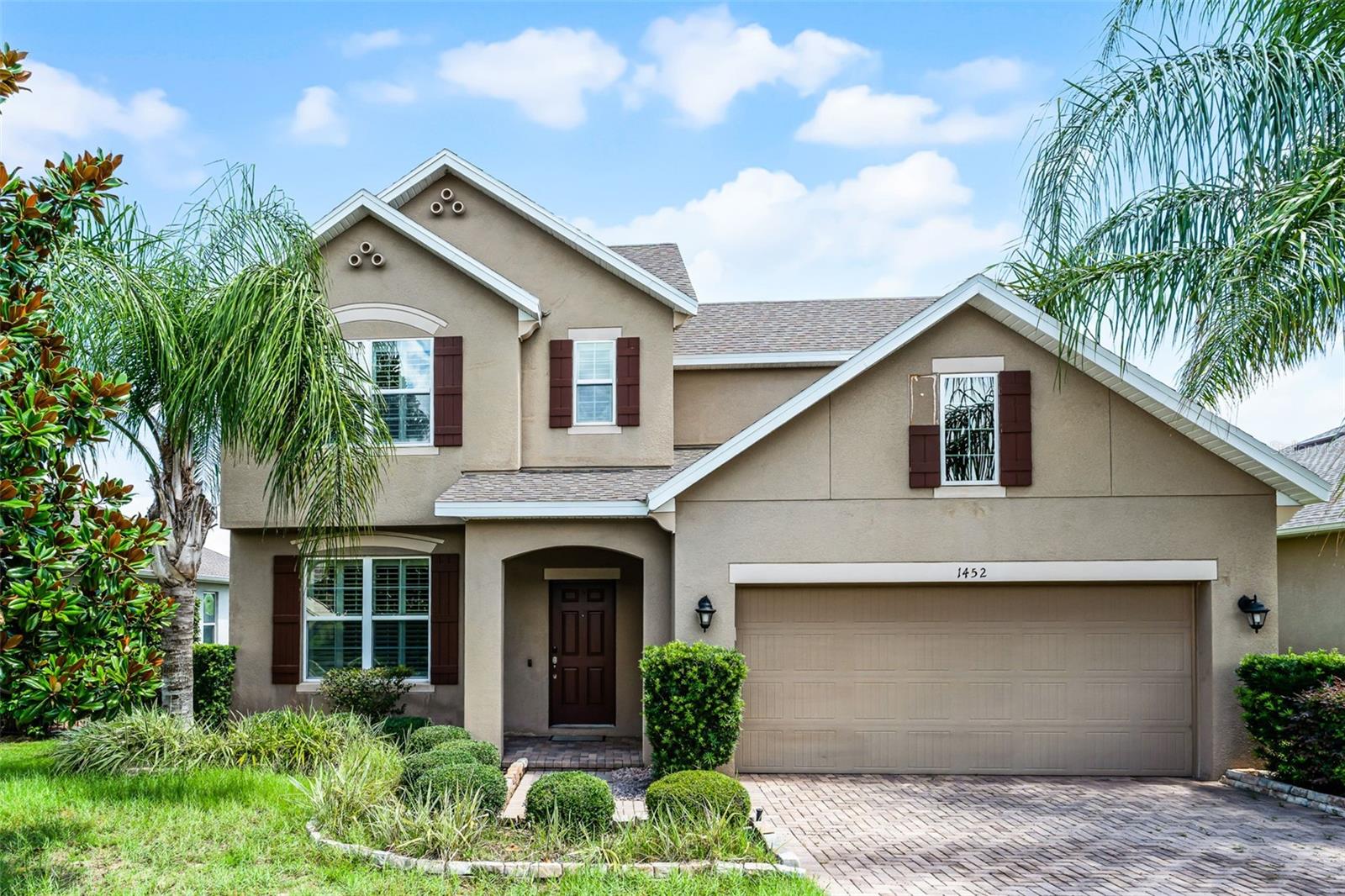 Welcome Home to 1452 Cabot Drive in the gated Harvest Landing right in the heart of Clermont. This 4 Bedroom, 21/2 Bath home offers 2,642 sqft of living space. The views of the Rolling Hills of Clermont from your back garden are stunning !! This home offers a paved driveway, 2 car garage, formal dining which could be used as a formal living or office. Spacious kitchen with granite counter tops, stainless steel appliances and sliding doors to your patio area. The Primary suite is downstairs offering a large walk in shower, dual vanities with granite and a spacious walk in closet. Upstairs we have a huge loft area which could be a living space/ play room / home office, there are 3 additional bedrooms and a full bathroom. As you come in through the garage we have the laundry/mud room. The monthly rent does include lawncare. Located close to shopping, Restaurants, schools and the Turnpike. This well maintained home has plenty to offer, call today for your own private tour !!! Other features include shutters on all windows, helping to keeep you cool from the Florida heat !!