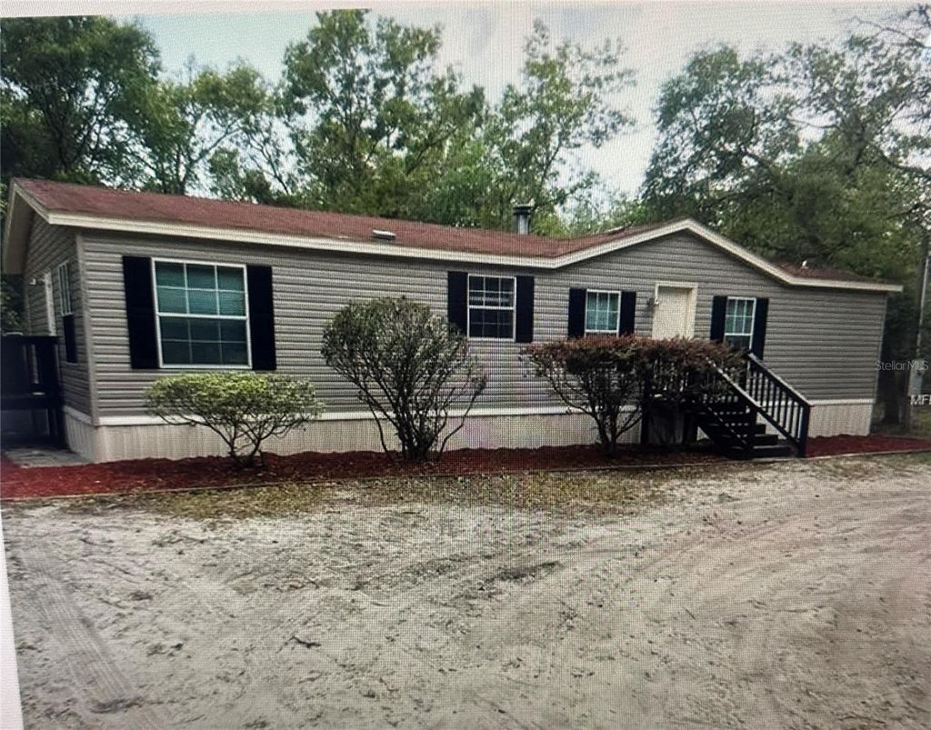 Photo of 12830 Robinhood Road, Hudson, FL 34669 (MLS # J999766)