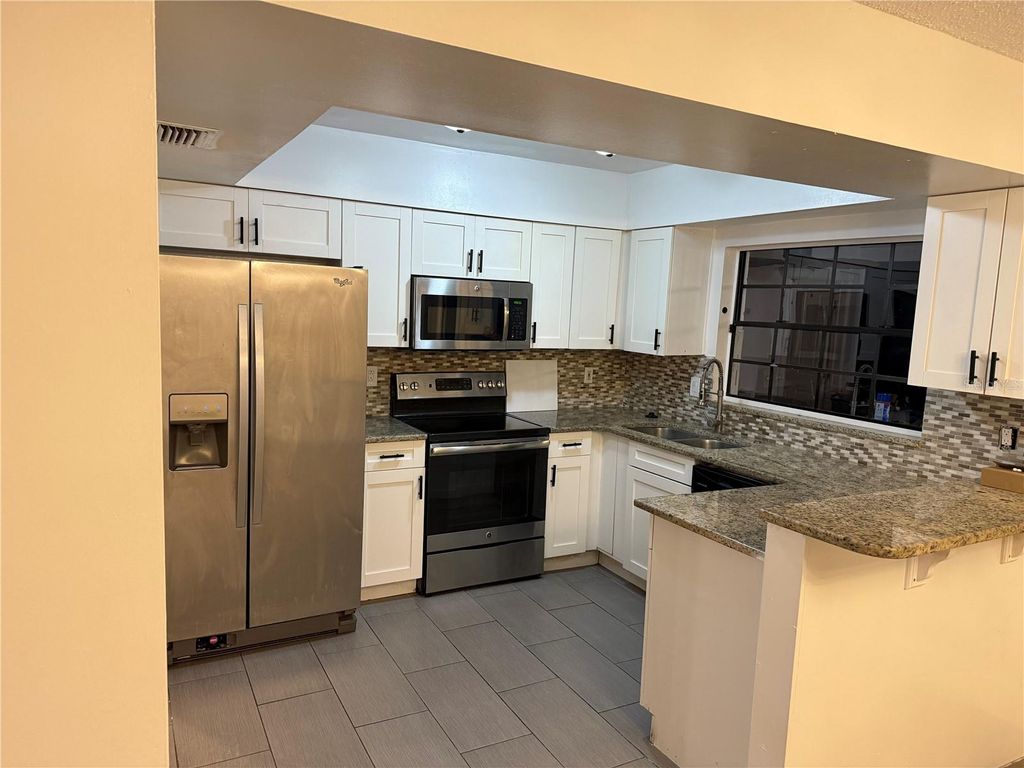 Photo of 17840 Morninghigh Drive, Lutz, FL 33549 (MLS # TB8446266)