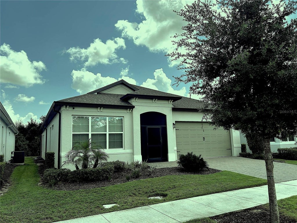 Photo of 1999 Limestone Trail, Kissimmee, FL 34747 (MLS # O6447154)