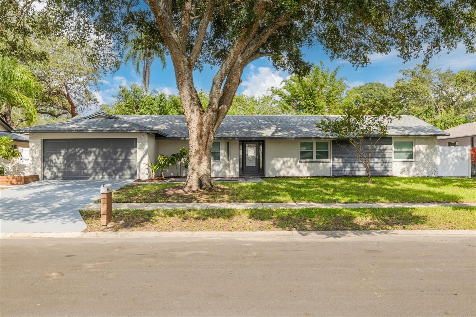 Don't miss out on this fabulous, remodeled, mint-condition, single family home. It has 4 bedrooms and 2 bathrooms in half with an amazing back yard. The home is located in a fantastic location! It has a spectacular living room throughout the first floor. The kitchen has granite counter-tops with wooden cabinets and stainless steel, top of the line smart appliances. high ceiling living room, All 4 bedrooms have vinyl floors. The master bathroom has a stand-up shower along with updated sink. The entire house is tastefully painted with plenty of closet space. The bathrooms are completely renovated with new vanity cabinets, tubs, a large shower, and modern accessories. It has hurricane shutters ,double glass windows, HVAC is the top of the line with smart thermostat, new fence and irrigation system. a nice new vinyl fence, it has plenty of space to play your favorite sports with your loved ones. minutes away from the beach Don't miss the opportunity to call this breathtaking property your new home.