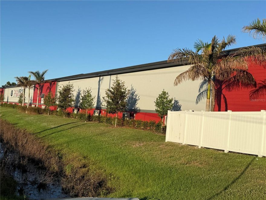 Why rent when you can OWN !? WAREHOUSE CONDOMINIUM UNIT #43 for sale at Twin Boys Storage in Punta Gorda. Conveniently located on Burnt Store Road with access to Punta Gorda, Burnt Store Marina and Cape Coral. This unit was built in 2020 and is 22 ft x 52 feet, total 1144 SF. The insulated overhead door is 15 feet high and 16 feet wide. The unit has numerous electrical outlets, a hosebib and a mini-split A/C unit. There is 100 amp service with independent meters with 50 amp plug in the unit - electricity runs $25/month. There is an HOA and the HOA fee is $187/ month. 72 foot turn radius between the two buildings. This property is gated, has a public men's bathroom and women's bathroom and a club room. This is a great place to store your boy toys (cars, boat, RV) where they will be in a clean, secure location.