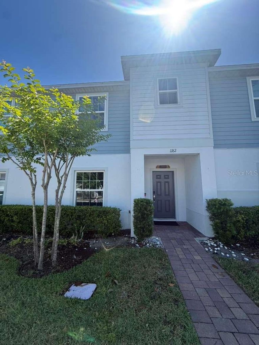 Beautiful and well-maintained two-story townhouse featuring 3 spacious bedrooms, 2 full bathrooms upstairs, and 1 convenient half bath on the first floor. This home offers an open floor plan with a modern kitchen equipped with updated appliances, solid wood cabinetry, a breakfast bar, and a cozy breakfast nook — perfect for everyday living and entertaining. Enjoy the private open patio in the back, ideal for relaxing outdoors. LOW HOA and NO CDD! Conveniently includes two assigned parking spaces directly in front of the unit. A great opportunity to own a move-in-ready home with comfort, functionality, and value.