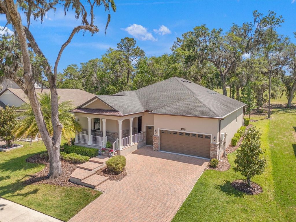 Photo of 4910 Southern Valley Loop, Brooksville, FL 34601 (MLS # W7874996)