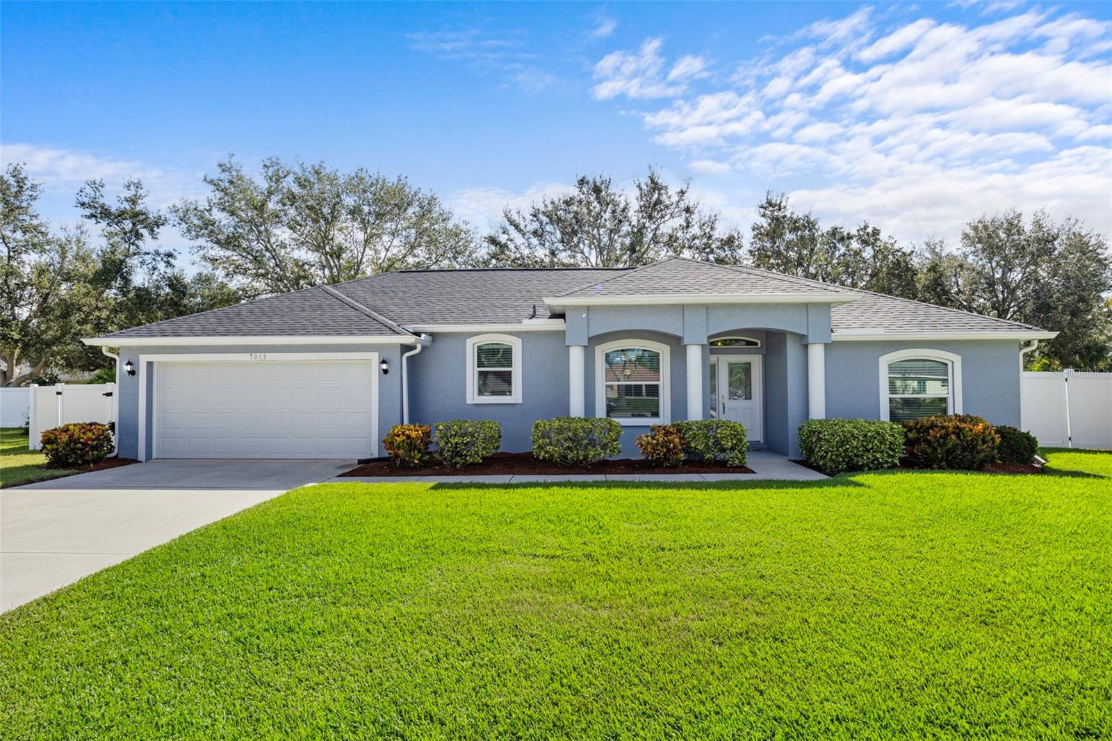Immaculate Coastal Retreat in Whitfield Gardens – Sarasota/Manatee County
Welcome to this stunning 3-bedroom, 2-bathroom pool home located in the highly desirable and charming neighborhood of Whitfield Gardens, nestled between Sarasota and Manatee County. Just minutes from the Sarasota-Bradenton International Airport and the world-renowned beaches of Siesta Key, Lido Key, Longboat Key, and Anna Maria Island, this home offers the perfect blend of vacation-style living and everyday comfort. Meticulously maintained and fully renovated from top to bottom, this residence truly shows like a model home. Step inside to discover a bright and airy open-concept layout with soaring cathedral ceilings and luxury waterproof vinyl flooring throughout. The brand-new chef’s kitchen is a showstopper, featuring custom light gray soft-close cabinetry with pull-out shelving, gleaming quartz countertops, and a huge center island perfect for meal prep and entertaining. All-new stainless steel appliances complete the space. Both bathrooms have been professionally remodeled, featuring custom tile showers that seamlessly reflect the home's overall design aesthetic. Thoughtfully selected materials and finishes create a cohesive, modern look, while the high-quality craftsmanship ensures lasting beauty and functionality. Enjoy peace of mind with all new hurricane-impact windows and doors, a new roof, and fresh interior and exterior paint. The thoughtfully designed floor plan opens seamlessly to the backyard oasis, where a newer self-cleaning pool with a screened enclosure awaits. The covered lanai offers ample room for BBQs and gatherings, making this home an entertainer’s dream. The fenced yard (PVC and new wood fencing) includes a dedicated dog run and large gated access, ideal for pets and privacy. The picturesque pond in the front adds a tranquil backdrop and even supplies irrigation for the beautifully manicured landscape. Whether you're looking for a permanent residence, vacation home, or investment opportunity, this home is move-in ready and fits any lifestyle.