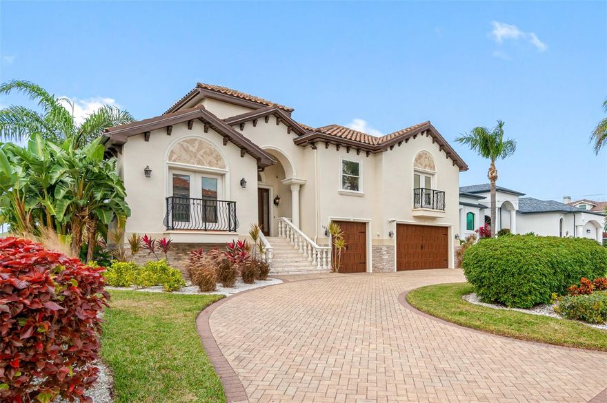 106 LEEWARD ISLAND offers tons of recent upgrades: NEW tile roof 2015, NEW Tankless gas water heater 2023, (2) NEW HVAC - 2 ton and 5 ton - 2023, (2) NEW impact rated garage doors and openers, NEW Gas pool heater (2023), wrapped poles on the dock, tinted windows, and a full ADT security system with front and rear door cameras. This superb 4 bedroom, 3 bath, 3 car garage waterfront residence offers an impressive 3,786 of total living sqft, 400 sqft of balconies, heated swimming pool with spa and an elevator to all levels. Built in 2007 at over 11’ elevation, you’ll benefit from high-quality construction and significantly lower flood insurance at only $1,000 per year! Boaters will appreciate the composite dock with an 8,000lb lift and a 13,000lb lift which were both recently updated with a new motor and cables, PLUS 2 Davits for smaller watercraft. With a commanding curb appeal and a coastal modern design, the inspiring architectural elements of the home are complemented by the distinguished elegant crystal chandeliers found in nearly every room. The grand 21' high foyer introduces an exceptional open floor plan with fine travertine flooring, coffered ceilings, 9’ doors and lovely, distinctive appointments throughout. The chef’s kitchen features a breakfast bar, a stainless-steel commercial size refrigerator, 6 burner gas cooktop, and wonderful granite counters with a tile backsplash. The large open dining space is complemented by a water view overlooking the sparkling pool. Welcome to the exquisite master bedroom suite, privately situated on the upper level, and enjoy balcony views of the waterfront, pool and sunset! Indulge yourself in the luxurious master bath with (2) walk-in closets and closet systems, jetted spa tub, separate wood/granite vanities and walk-in shower. On the 2nd level, the second and third bedrooms are generously sized and share a large attractive full bath and the larger bedroom has a second upper-level balcony and walk-in closet. The office/4th bedroom on the main level has its own balcony and a built-in murphy bed. Take a reprieve from your busy day and take in the stunning sunsets from your own backyard oasis! Enjoy an expansive travertine deck with plenty of seating for guests, outdoor kitchen with natural gas and a fully fenced in yard. From your living room, you’re less than a mile to the white sands of Clearwater Beach, or a 10 minute boat ride from your dock to the Gulf of Mexico with minimal no-wake zones and no fixed bridges – offering you the best of boating and the beach! Come live the Island Life and you'll enjoy many conveniences like Publix, restaurants, gas station, mechanic and the Clearwater Marine Aquarium. 106 LEEWARD ISLAND is a superior luxury home and an outstanding waterfront value. All dimensions are estimates. Buyer to verify all dimensions.