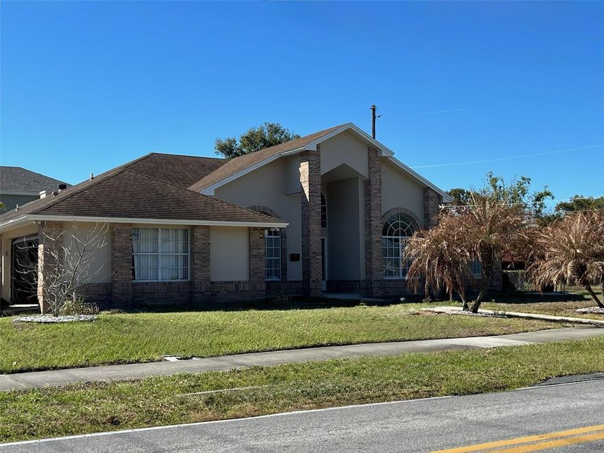 Unique 4 bedroom, 3 bath home situated between Downtown Orlando and OIA in the established Conway area.  Completely updated.  Features vaulted ceilings, formal areas and open kitchen/family room with wood burning fireplace.  Large walk-in pantry and inside laundry room.  French doors from family room, formal areas and primary bedroom open to a covered patio plumbed for summer kitchen.  Primary bedroom has sitting area, double sinks, large shower with bench, and walk-in closet.  Attached Workshop/storage room at rear.  Back yard perfect for a pool.  Spacious, comfortable and convenient.