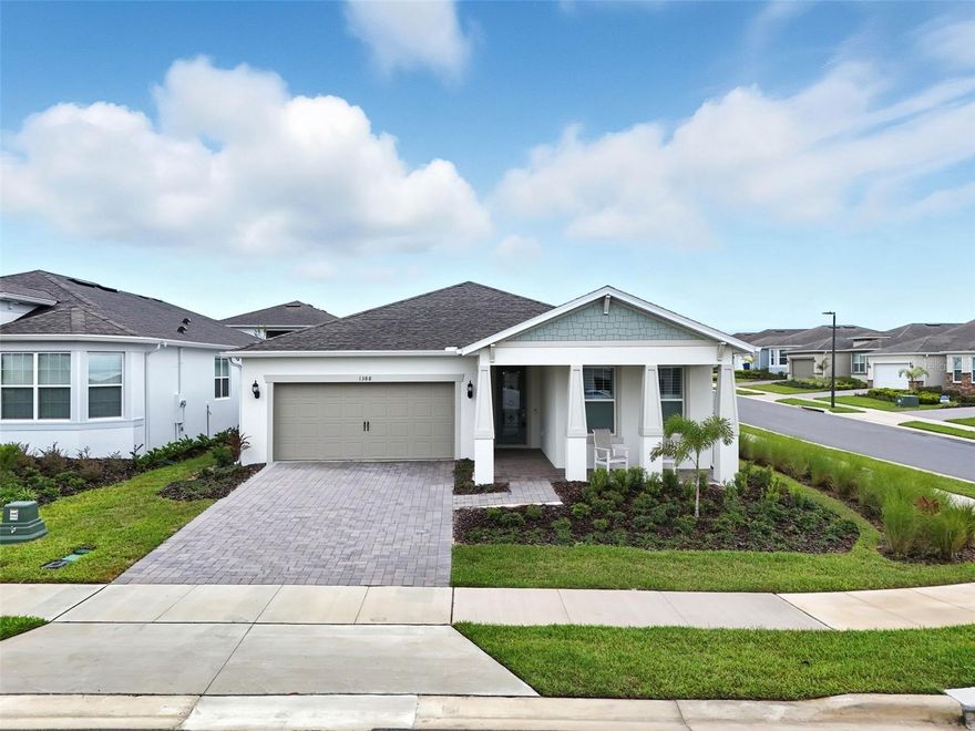 Stunning Upgraded Home with Spectacular Lake Apopka Views. Welcome to your dream home! This brand new Prestige Model is nestled on a premium corner lot overlooking breathtaking Lake Apopka, offering serene panoramic views and picturesque sunrises from your extended covered patio. Located in the luxurious, guard-gated 55+ community of Del Webb Minneola, this immaculate single-story home combines high-end finishes, thoughtful upgrades, and modern smart home features—all set on one of Florida’s highest elevations. Key Features & Highlights include Designer Upgrades of almost $100,000 in Added Value! Features include: Plantation shutters throughout, Electronic shade on patio slider door, Smart security system with cameras, Surround sound system, GE Profile washer and dryer, Tray ceilings and ceiling fans, Epoxy-coated garage floor with heavy-duty storage shelving, and whole-home water filtration system. Spacious & Functional Floor Plan offers 2 spacious bedrooms, each with a private en-suite bathroom, Enclosed flex room and powder room for guests. Enjoy preparing meals in your new Gourmet kitchen with 42" upgraded cabinetry, Decorative tile backsplash, stainless steel appliances, Natural gas built-in cooktop and large pantry. Luxury Living Meets Smart Home Convenience, enjoy a Smart thermostat, smart doorbell, digital IP cameras, LED downlights throughout, 8' interior doors & tall ceilings for an open, airy feel. Private Owner’s Suite Retreat with dual sinks, enclosed shower, Two large walk-in closets and additional linen closet. Don’t Miss This Exceptional Lakeview Home, This pristine residence perfectly blends luxury, comfort, and technology—all in one of Central Florida’s most sought-after 55+ communities. Whether enjoying a quiet sunrise or entertaining under the stars, this home is ready to elevate your lifestyle. Schedule your private showing today!