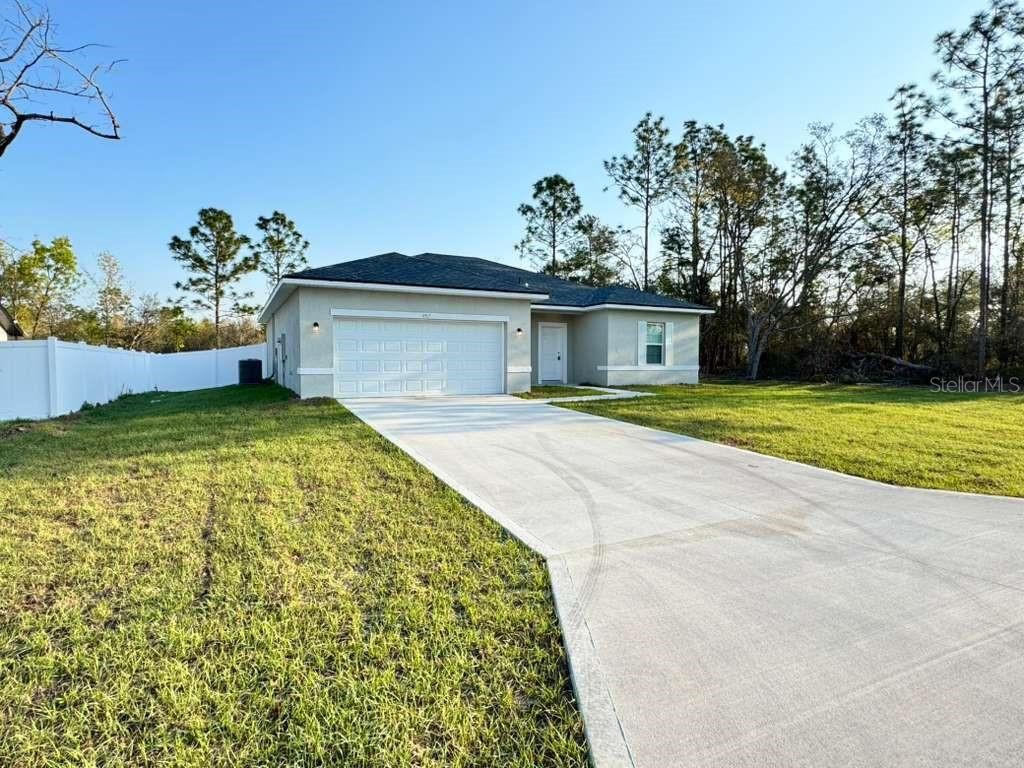Photo of 4967 SW 150th Lane, Ocala, FL 34473 (MLS # OM721329)
