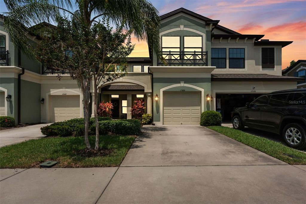 Photo of 11526 Crowned Sparrow Lane, Tampa, FL 33626 (MLS # TB8393692)