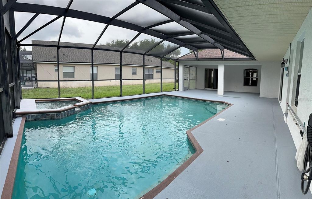 Photo of 16016 Blossom Hill Loop, Clermont, FL 34714 (MLS # S5142471)