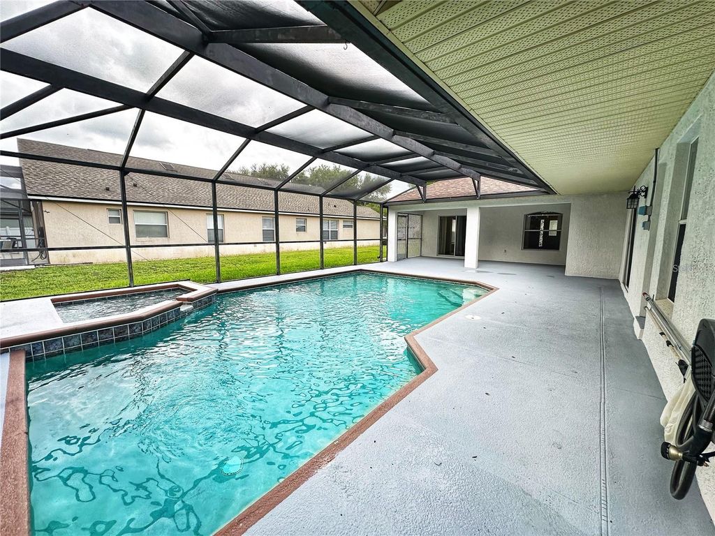 Photo of 16016 Blossom Hill Loop, Clermont, FL 34714 (MLS # S5142471)