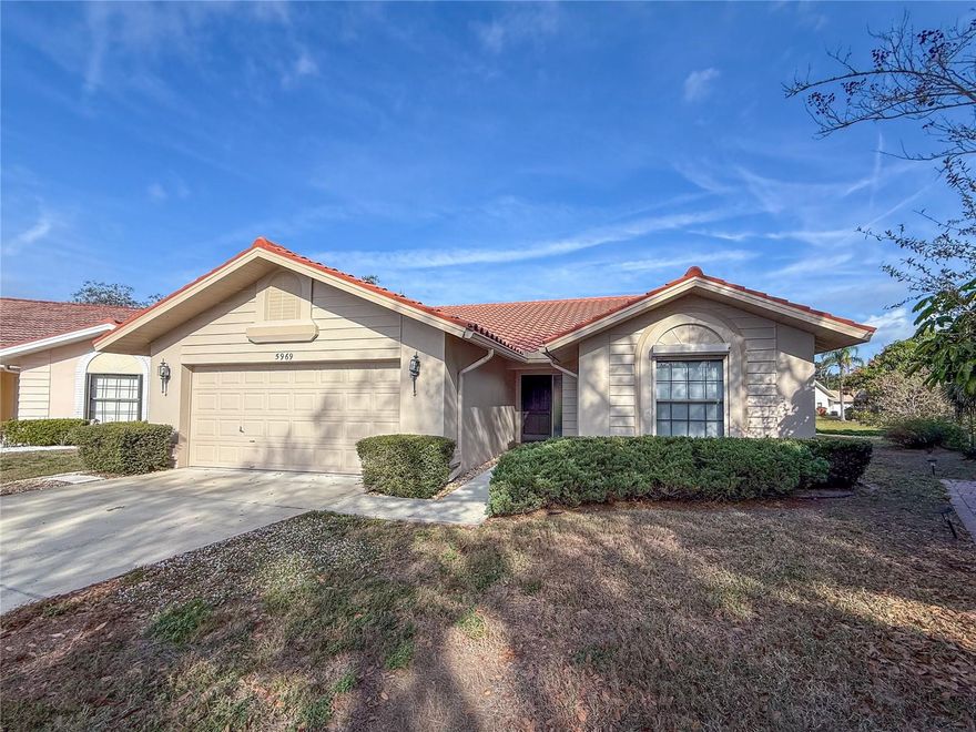 **Priced to sell and full of potential in sought-after Longwood Run!** This three-bedroom, two-bath, two-car garage single-family home is ideally situated on a tranquil lake, offering peaceful water views and exceptional bird and wildlife watching from both the screened lanai and open-air patio.

Built with quality craftsmanship, the home features solid interior doors and a well-designed SPLIT FLOOR PLAN with generously sized rooms throughout, creating a spacious and comfortable layout. The primary suite is a true retreat, offering TWO WALK-IN CLOSETS, an oversized ensuite bath with DUAL SINKS, a large garden SOAKING TUB, and a stand alone shower, along with French doors that open to a very large screened lanai overlooking the pond.

The two additional bedrooms are also spacious, each with extra closet space, providing flexibility for guests, home offices, or hobbies. The functional kitchen layout includes a center island with cooktop, breakfast bar seating, and a bright dining nook set in a bay window. An INSIDE LAUNDRY ROOM with utility sink adds everyday convenience.

While the home needs updates and cosmetic improvements, the bones are solid, with many important improvements already completed. Major updates include A/C installed in 2021, hot water heater installed in 2022, tile roof replaced in 2011, and the third nail roof-to-wall reinforcement was completed in 2020. Additional peace of mind comes from a whole-house surge protector. The exterior was recently painted, and the lanai has been recently re-screened, allowing the next owner to enjoy the outdoor living space immediately.

Located in the well-established, active lifestyle community of Longwood Run, residents enjoy access to Longwood Run Park featuring a baseball field, outdoor basketball court, playground, picnic pavilion, dog-friendly areas (leash required), gymnasium, recreation building, indoor rental space, and both indoor and outdoor pickleball courts.

Homeowners may also opt into membership at the Longwood Run Athletic Club, offering a world-class lineup of amenities including a fitness center, aerobics and dance studios, sauna, restaurant and lounge, pro shop, multipurpose spaces, a resort-style pool with expansive patio, 18 tennis courts, and all-sports courts—perfect for enjoying the Florida lifestyle year-round.

Offered at an affordable price, this lake-front home presents a rare opportunity to update, personalize, and add value in a prime Sarasota location. Bring your vision and make this special property your own.