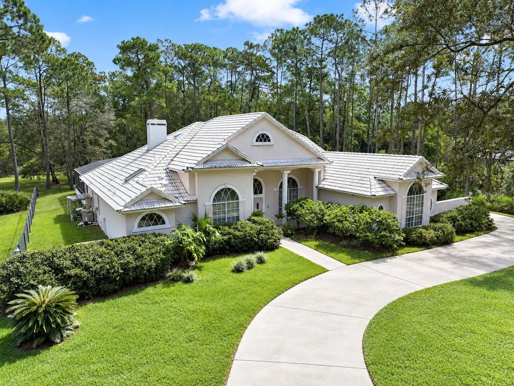 Photo of 4937 Chuluota Road, Orlando, FL 32820 (MLS # O6445040)