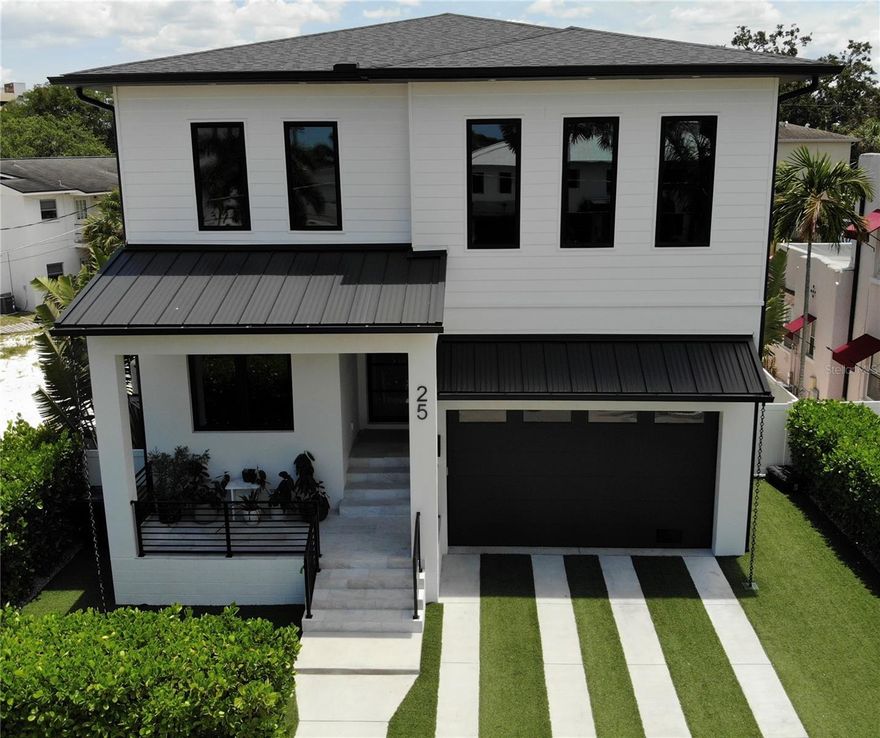 Under Construction. Currently under development, this exceptional two-story single-family residence is meticulously crafted for your utmost comfort and practicality. Situated on the serene and welcoming Geneva Place on Davis Islands, this location remains one of the area's best-kept secrets. Boasting a 2-car garage, a pool/spa combination, an outdoor grilling area, and two expansive levels of living space, this home offers 4 bedrooms, 4 bathrooms, and nearly 4,000 square feet of heated living area.

The ground floor features a spacious great room/kitchen duo equipped with top-of-the-line Professional GE Monogram appliances, wine and beverage refrigerators, a generous dining space, and a convenient mudroom adjacent to the garage. Additionally, a first-floor bedroom with an attached bath and walk-in closet is also present.

Ascending to the upper floor, you will discover a luxurious master suite with a sizable sitting area, custom his and hers closets, and a spa-like bathroom with a freestanding tub. Two more bedrooms with en-suite bathrooms, a versatile flex room suitable for various uses, and a laundry room complete the second level.

The outdoor area is designed for seamless Florida entertainment, featuring a saltwater pool, a sun shelf, and spa by Blue Sky Pools, all enclosed within a fully fenced and landscaped backyard. Noteworthy features of this turnkey residence include icynene open-cell foam insulation in the attic and between floors, Gypcrete installation on the second level, sound barrier Batt insulation, a 16 SEER split HVAC system, pre-wiring for security cameras and multi-zone music systems, low-E impact-rated windows and doors, built-in home pest defense tubes, and an automated Rainbird irrigation system. The lofty garage ceilings provide ample space for the buyer to easily install a car lift.

Located on beautiful Davis Islands a short distance from the walking and bike path and a short distance from Davis Islands Village with many restaurants, shops, and bars. Bring your golf cart and enjoy the Island lifestyle with walking / biking paths, baseball fields, public tennis courts, public historic pool, two dog parks, a beach, public marina, and an airport. Additionally, located only minutes from Downtown Tampa, Water Street, Sparkman Wharf, and the Tampa Riverwalk, makes this neighborhood the most desired in South Tampa.