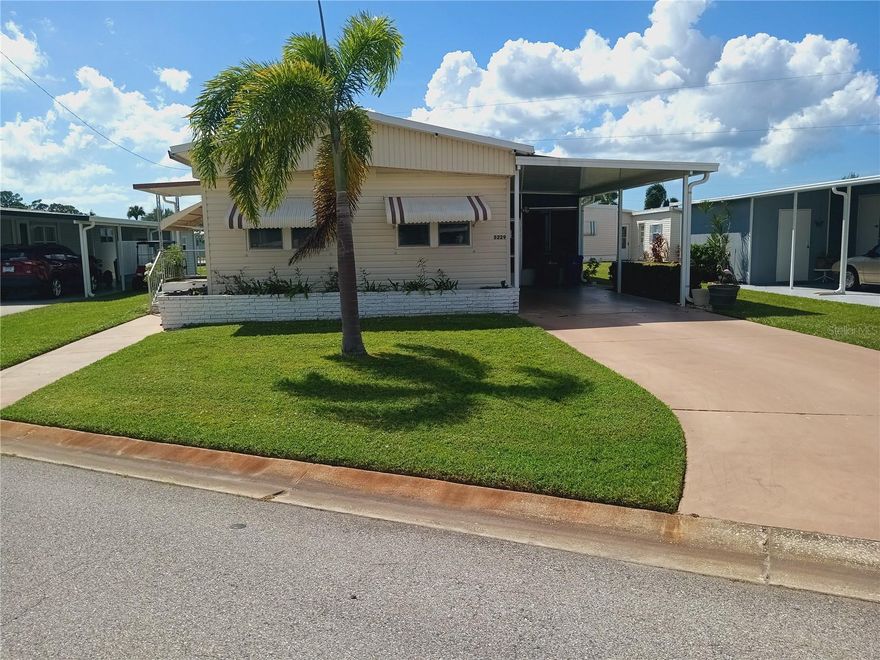 This furnished two-bedroom, two-bathroom home spans 1,060 square feet and includes spacious bedrooms, dining room cabinets, a new TPO roof, carport, covered laundry, and a screened-in area. Tri-par Estates offers amenities such as a year-round heated/cooled pool, spa, tiki hut, pickleball, fitness center, shuffleboard, miniature golf, horseshoes, game rooms, plus arts and crafts classes. The clubhouse hosts frequent social events. Conveniently located near downtown Sarasota, World-renowned beaches including Siesta Key and Lido Key are only a short drive away for leisure and relaxation, marinas, shopping, dining, museums, and the airport. Land rights are included with an annual $1,648 fee in your property taxes—no direct HOA fees. The community is golf cart-friendly and offers optional RV/boat storage.