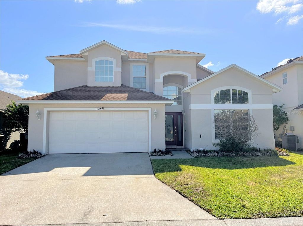 Photo of 212 Purslane Pass, Davenport, FL 33897 (MLS # O6401510)