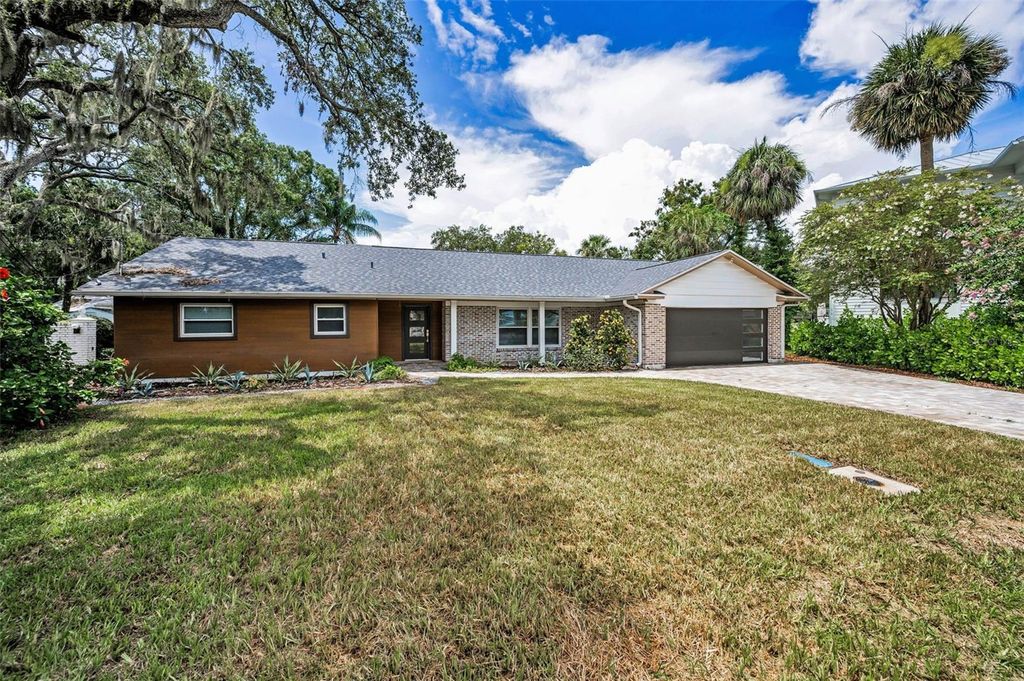 Photo of 409 S Barbara Lane, Tampa, FL 33609 (MLS # W7877030)