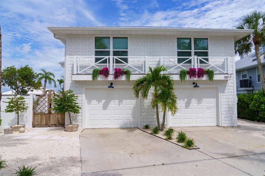 Photo of 7 Palm Harbor Drive, Holmes Beach, FL 34217 (MLS # A4662583)