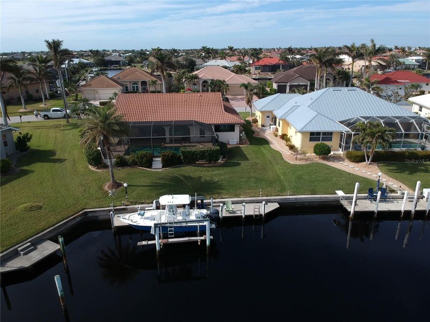 Welcome to 3448 Nighthawk Court in Beautiful Punta Gorda Isles. This home boasts 3 bedroom, 2 bath, pool, and sailboat water to Charlotte harbor. The home is perfect for both relaxation and entertaining. The bright and airy Great room flows seamlessly into the modern kitchen, complete with stainless steal appliances, granite countertops ,and large island. Step outside where you can relax by your own pool, or down to the dock for a sunset cruise. Punta Gorda is a friendly boating community with so much to offer.