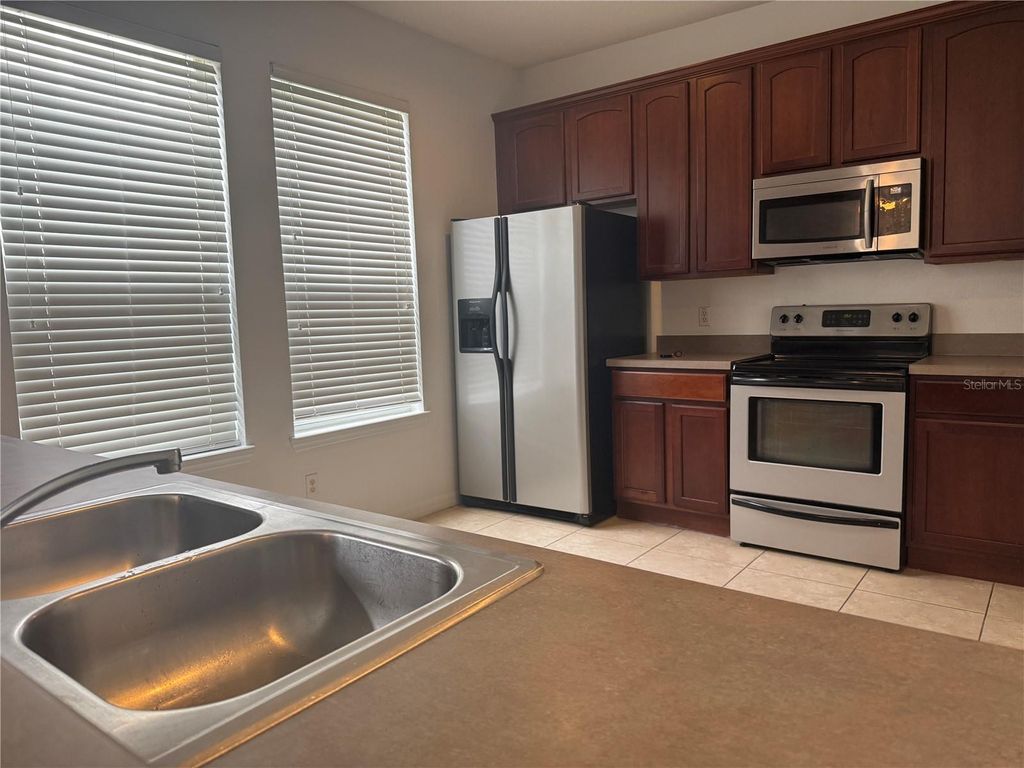 Photo of 10825 Spider Lily Drive #29B, Orlando, FL 32832 (MLS # S5143646)
