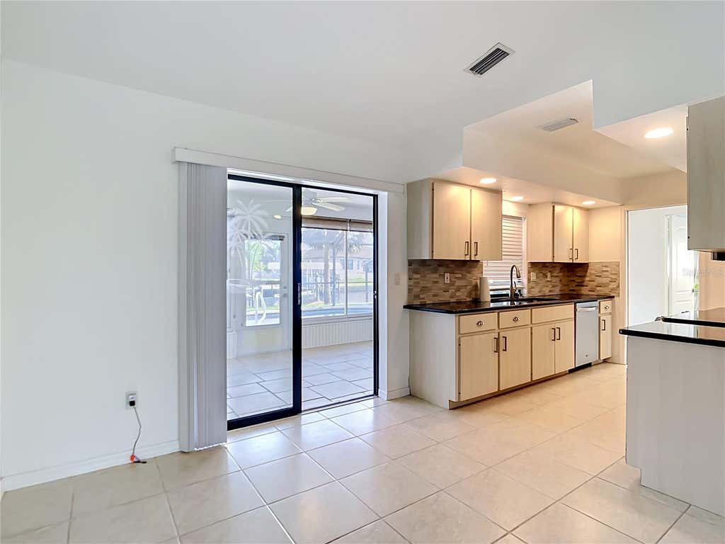 Photo of 12430 Mitchell Terrace, Port Charlotte, FL 33981 (MLS # A4693463)