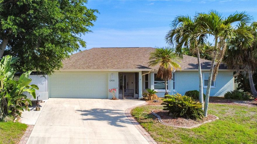 This 2 bedroom/2 bath waterfront single-family home offers 1,220 sq ft on a 0.23 acre lot plus an additional included lot, creating added value and future potential. Interior features include a functional kitchen with granite countertops, laminate cabinetry, matching white appliances, and tile flooring. The living and dining areas feature tile flooring throughout, while the sunroom provides flexible bonus living space ideal for entertaining, office use, or relaxation. Bedrooms include carpet flooring and reach-in closets with bi-fold louvered doors, and bathrooms feature wood under-sink cabinetry.
Located on a sailboat-access canal with direct Gulf access, this cul-de-sac property offers strong end-user, seasonal, or rental appeal. Exterior features include a 2-car garage, covered front patio, covered swimming pool, mini storage shed, and a wide backyard with waterfront access. The additional lot provides extra outdoor space, expansion potential, or added privacy rarely found at this price point. Major updates include a 2-year-old roof and 1-year-old A/C, making this property move-in ready with key systems already updated.