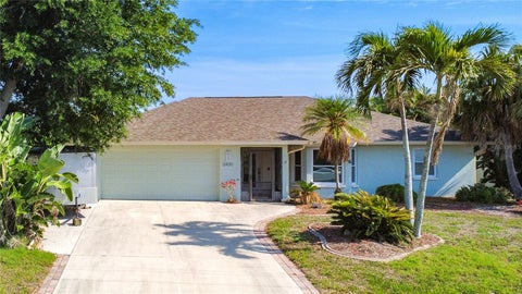 Photo of 12430 Mitchell Terrace, Port Charlotte, FL 33981 (MLS # A4693463)