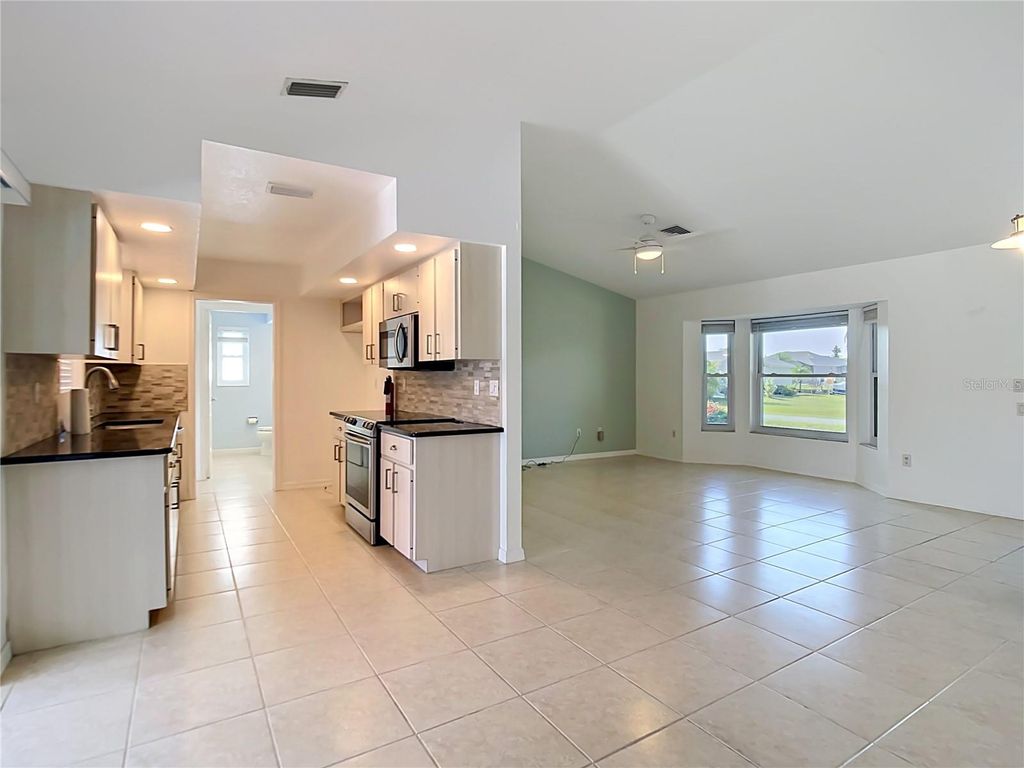 Photo of 12430 Mitchell Terrace, Port Charlotte, FL 33981 (MLS # A4693463)