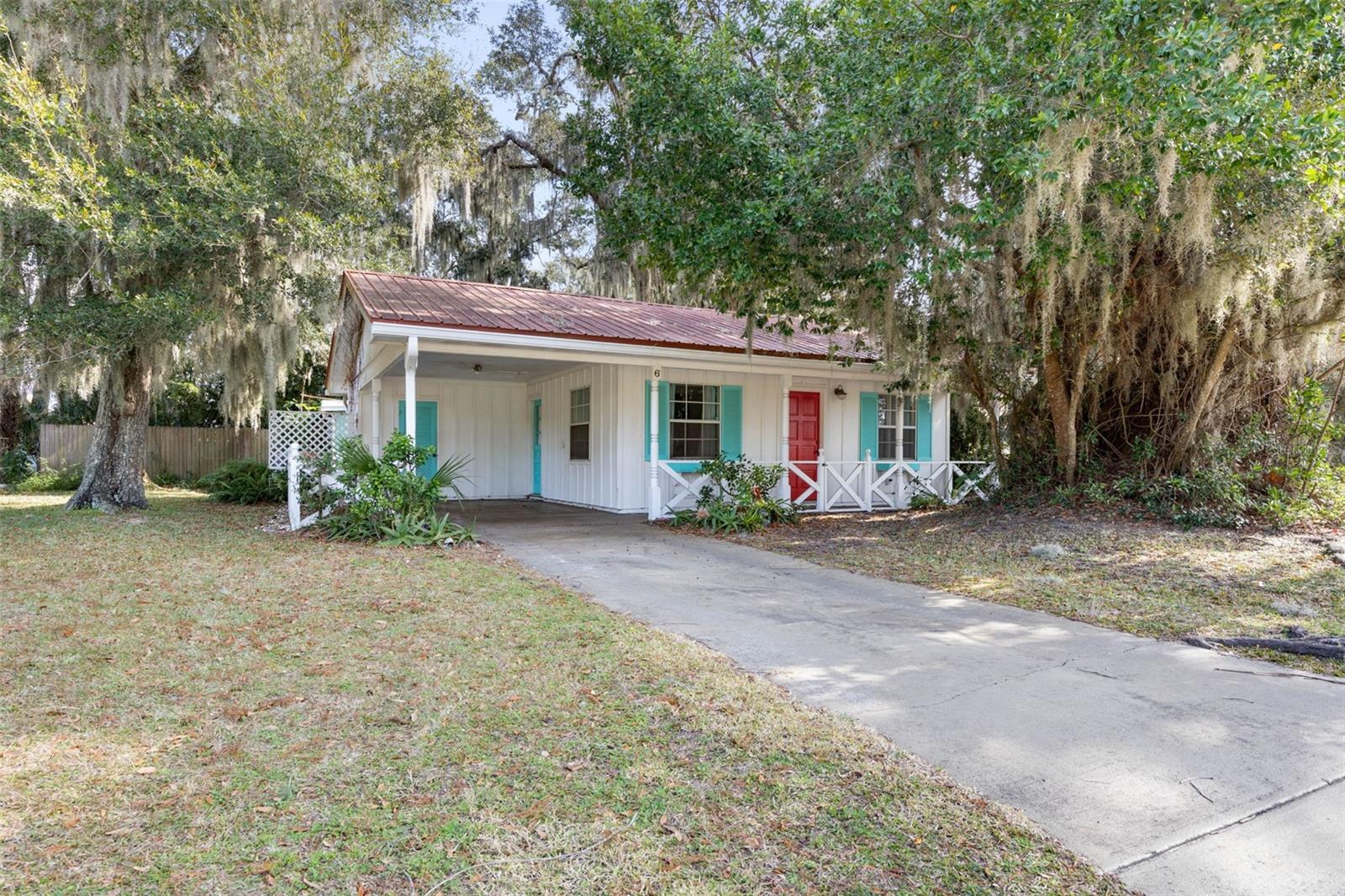 A “Cozy Cottage” sanctuary in the heart of Palm Coast’s serene Palm Harbor community. This home features a secure and comfortable artistic feel, all nestled under a very durable metal roof. Featuring charm and character, this home is private, yet close to shopping, fine restaurants, schools and community social activities. The Kitchen is very functional with a dining area, and updated appliances. The main living area features laminate flooring and a gas fireplace. The other bedrooms are large enough for additional family members or guests. Master bedroom has a private bath. The allure continues outdoors, where the generous yard beckons with ample space for entertaining and relaxing. The covered and screened lanai and deck are perfect for entertaining, crafting. or just relaxing while listening to the breeze flowing through the leaves of the large oak trees. The present Homeowner’s Insurance Policy is very affordable and the agent & company information will be passed on to the new owners.