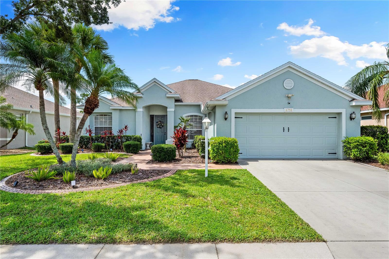 Welcome to this stunning home in the desirable Whisper Bend community featuring three bedrooms, two bathrooms, plus a bonus room/den and over 2,100 square feet of Florida living at its finest! This meticulously maintained and upgraded home is your gateway to the ultimate Florida lifestyle.
The gourmet kitchen boasts upgraded cabinets with brand new brushed nickel hardware, granite countertops, Samsung and LG stainless steel appliances, subway tile backsplash, and a reverse osmosis drinking water system. The eat-in area overlooks your private saltwater pool oasis.
The spacious Primary suite features additional HVAC ductwork for optimal cooling and opens directly to the lanai for seamless indoor-outdoor living. The Primary bathroom offers dual sinks, separate garden tub, and a large walk-in shower with rainfall and spa showerhead. The great room showcases a custom shiplap wall, and built-in electric fireplace.
Interior upgrades include luxury vinyl plank flooring, a fully updated guest bath with quartz countertops, window treatments, vaulted ceilings, electrician-installed dimmer switches throughout, and a newer roof installed in 2020. For ultimate peace of mind, enjoy a Briggs and Stratton whole house generator (2023) with automatic weekly testing, professionally maintained HVAC, and 4-year-old Rinnai tankless water heater.
Your private Florida paradise awaits in the large fenced backyard! Dive into the upgraded saltwater pool with new LED lighting, perfect your game on the putting green, or relax on the paved patio. A child safety pool fence ensures family security.
Additional features include all TV mounts, recycling center cabinet, abundant storage, and convenient laundry room. Located minutes from pristine beaches, world-class shopping, and restaurants with easy interstate access - this is Florida living at its absolute best!