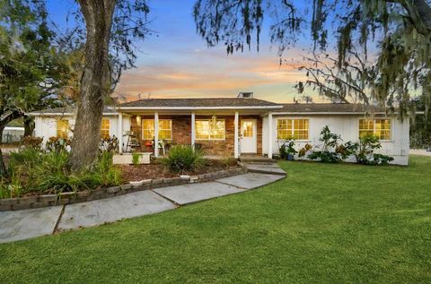 Photo of 3009 Jim Johnson Road, Plant City, FL 33566 (MLS # TB8476726)