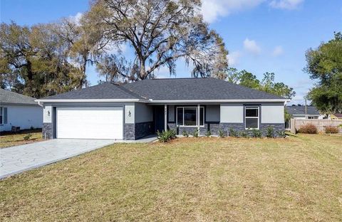 Photo of 781 NE 130th Terrace, Silver Springs, FL 34488 (MLS # O6381920)