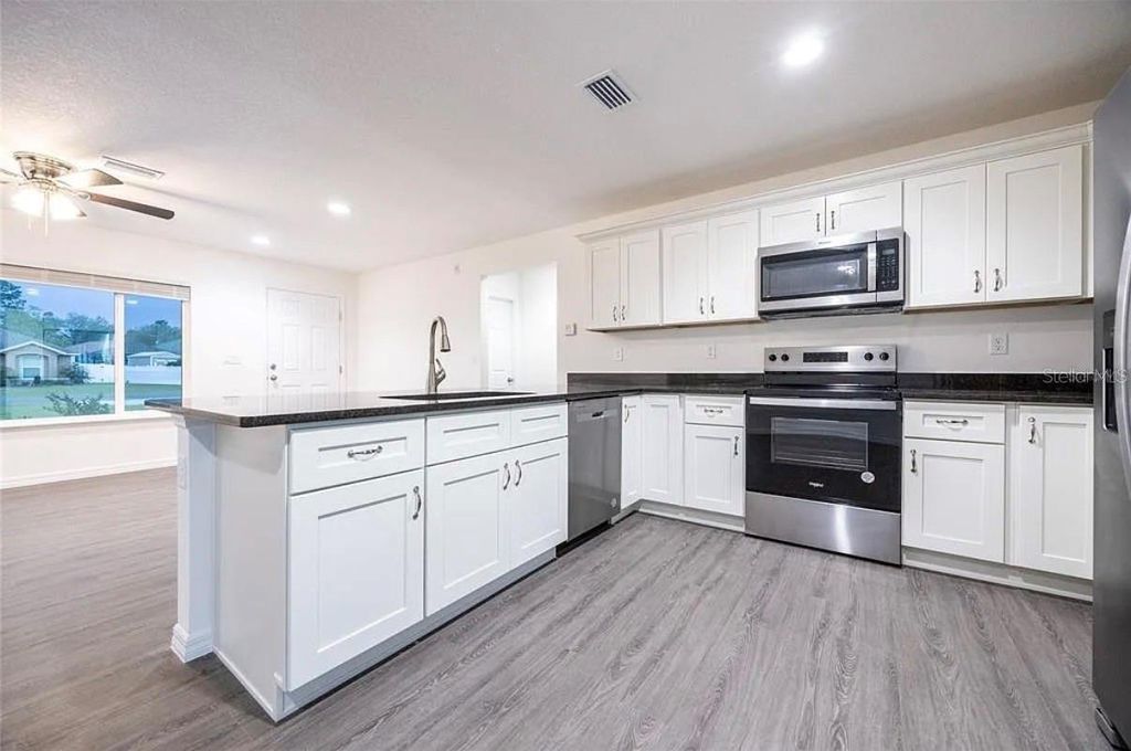 Photo of 781 NE 130th Terrace, Silver Springs, FL 34488 (MLS # O6381920)