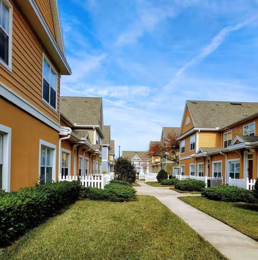 Discover the Villas at Seven Dwarfs community, a guard-gated oasis in the heart of Kissimmee. This townhouse-style unit features a first-floor master bedroom, quartz countertops, stainless steel appliances, and remodeled bathrooms. Enjoy effortless shopping with Target next door and a short walk to the vibrant Hwy 192, filled with restaurants and attractions. Just minutes from Walt Disney World, SeaWorld, and Universal Studios, this location is unbeatable. The community boasts resort-style amenities, including a pool and spa, clubhouse, fitness center, tennis and basketball courts, playgrounds, and a fishing pier. Whether you're seeking a short-term rental, a vacation home, or a primary residence, this condo is perfect. With 24-hour guard security, it won't last long. Schedule your showing today!