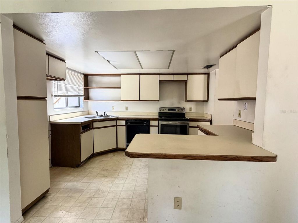 Photo of 5509 Lighthouse Road, Orlando, FL 32808 (MLS # O6399626)