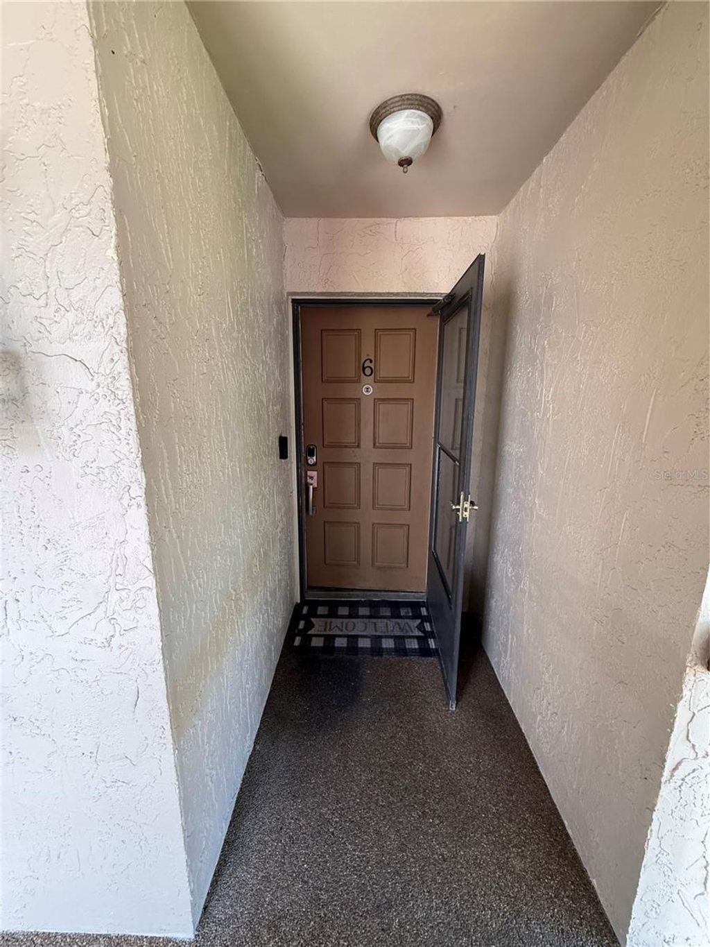Photo of 7015 Cognac Drive #6, New Port Richey, FL 34653 (MLS # TB8513749)