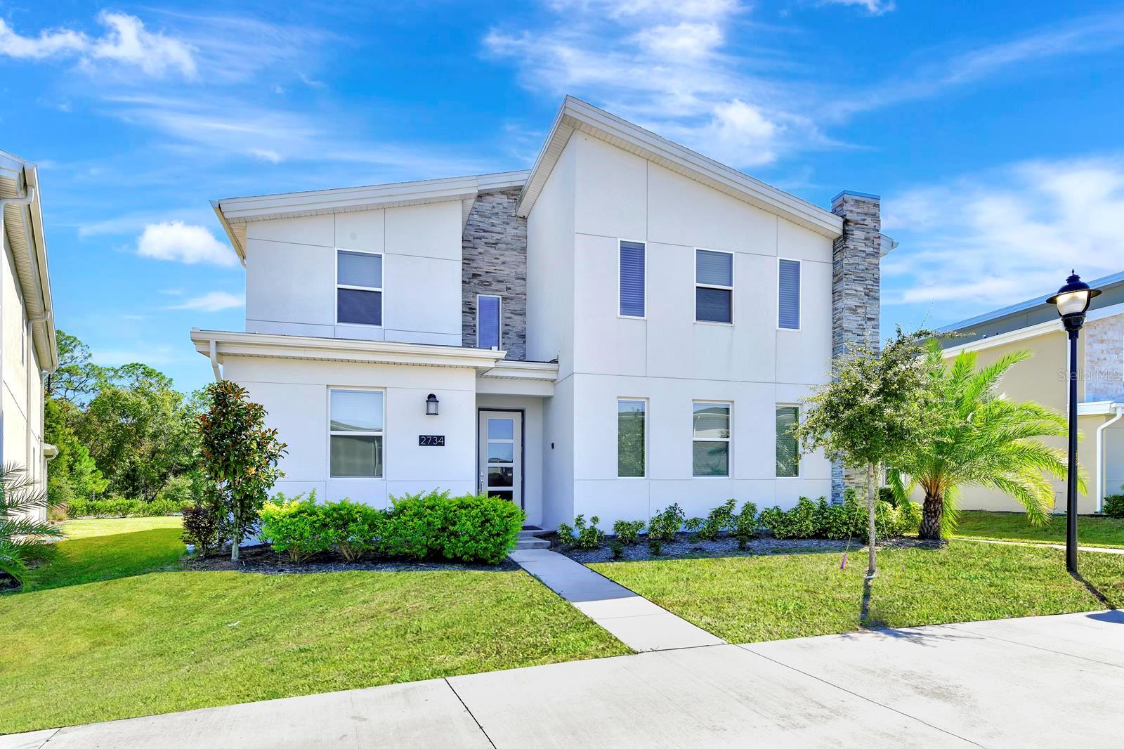Don't miss this opportunity, this is truly a ONE-OF-A-KIND vacation home! This beautiful 9-bedroom, 5-bathroom home is a work of art with the entire home's interior painted by a professional artist with an aquatic theme. Located in Storey Lake, one of the most popular vacation rental communities in the Central Florida, it's just minutes to the Disney entrance. The home has a fantastic location within the community as it's just a 2-minute walk to the fabulous clubhouse and amenity center! The home is being sold fully furnished and it offers loads of space to entertain and features an open concept floor plan. The kitchen has quartz counter tops, 42" white cabinets, beautiful black appliances and a large breakfast bar. All the bathrooms have waterfall shower panels and LED lighted mirrors. The huge combination living room and dining room make it the perfect home for large groups and family gatherings and there's a magnificent games room for everyone to enjoy as well as a karaoke room! It even has 2 water heaters so guests with large groups will never run out of hot water! It features a massive covered lanai with an outdoor kitchen for those afternoon cook outs, a brick paver deck and large heated pool and spa, and best of all it backs up to a conservation area so there are no rear neighbors!...This premier vacation resort community offers top of the line amenities including a grand clubhouse with concierge services, a restaurant and Tiki bar, resort style swimming pool and spa with a lazy river, water slides and cabanas surrounding the pool, an arcade, fitness center, business center, and even a theater! Storey Lake has a great location with easy access to Disney, Universal, Sea World and all that Central Florida has to offer! This home has to be seen to be believed!