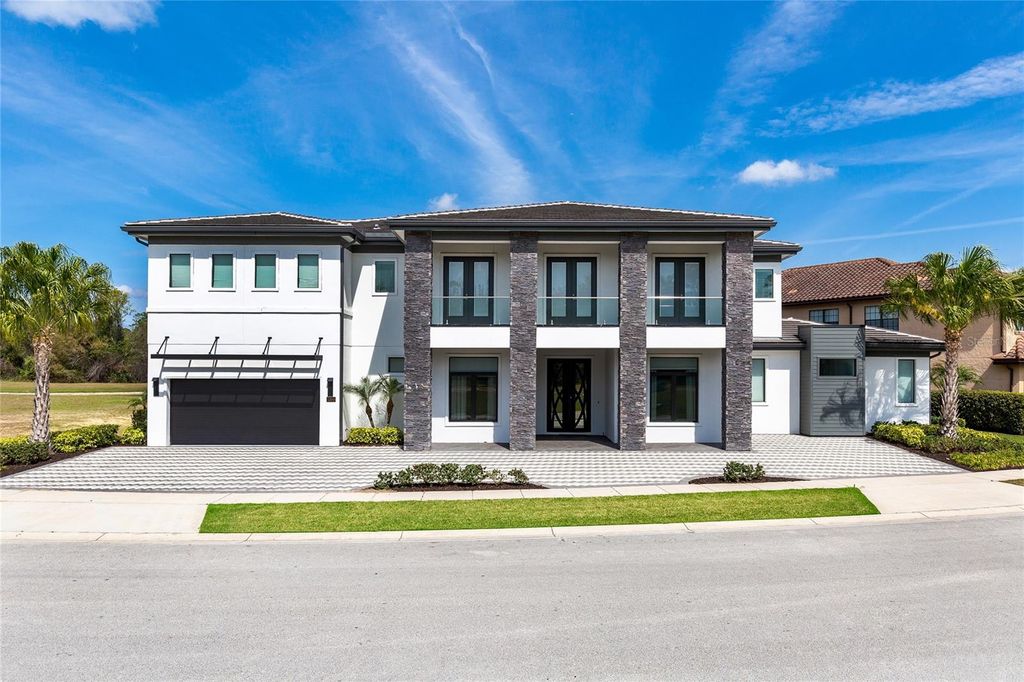 Photo of 1200 Grand Traverse Parkway, Reunion, FL 34747 (MLS # O6401878)