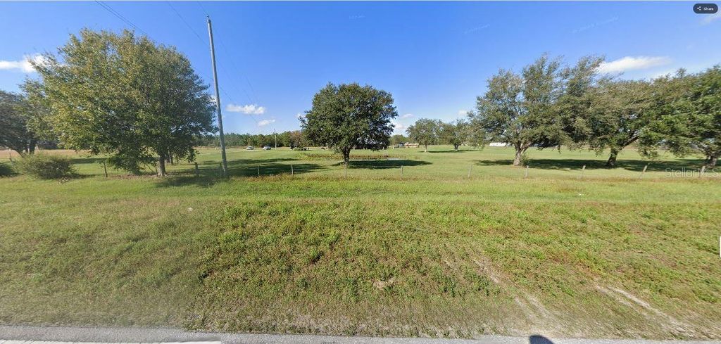 Photo of Old Grade Rd, Polk City, FL 33868 (MLS # O6266364)