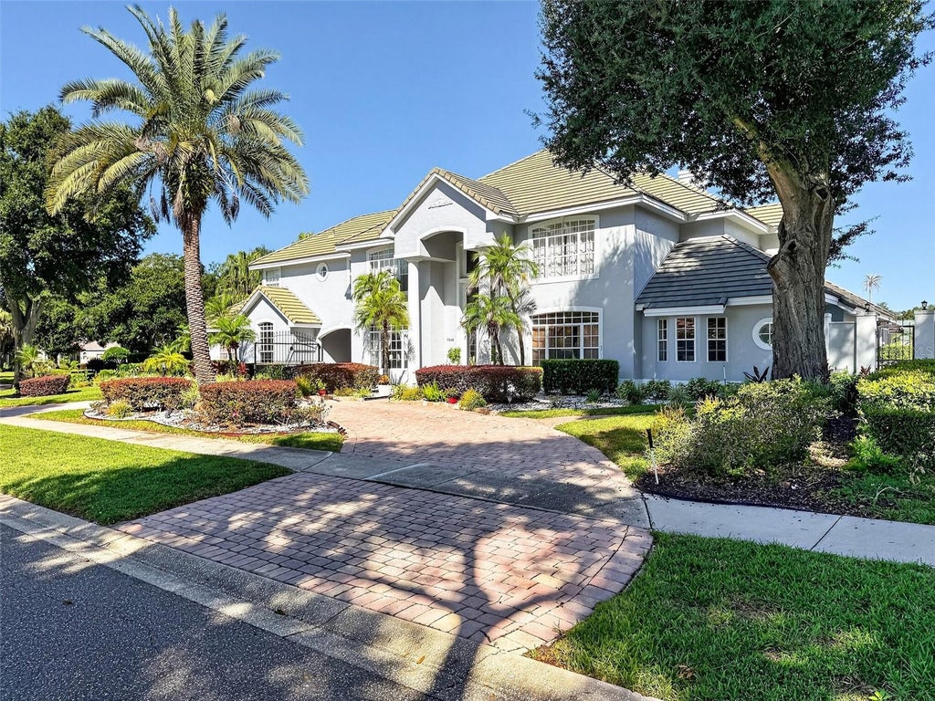 Photo of 7546 Park Springs Circle, Orlando, FL 32835 (MLS # O6453966)