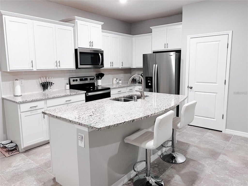 Photo of 6547 Calypso Coral Lane, Sarasota, FL 34240 (MLS # A4711024)