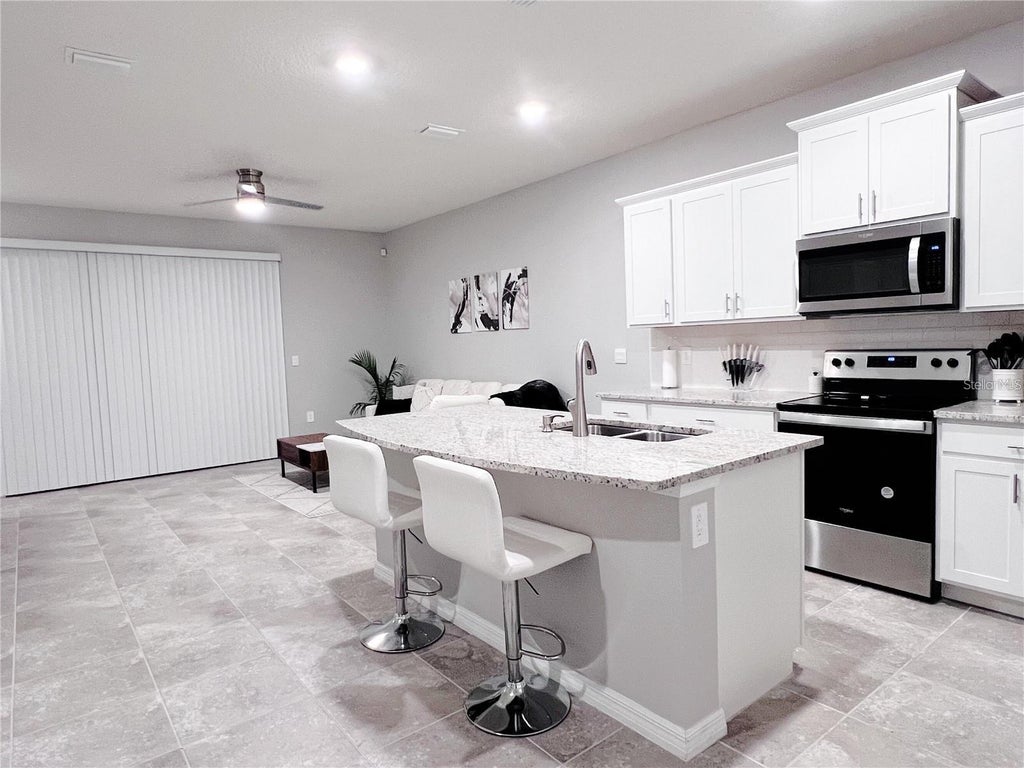 Photo of 6547 Calypso Coral Lane, Sarasota, FL 34240 (MLS # A4711024)