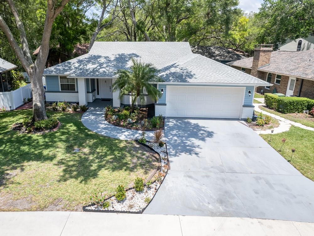 Situated in a well maintained and established community; this beautiful, FURNISHED home provides its community members with a low maintenance lifestyle. Arbor Oaks is a NON-AGE RESTRICTED HOA community. The HOA includes internet, exterior lawn maintenance, community pool maintenance, and even irrigation maintenance! This gorgeous home is just steps away from the community HEATED swimming pool. Just 7 miles from the beautiful beaches of Anna Maria Island. Nearby to numerous shopping centers, dining, and entertainment. This location highlights the beauty that Bradenton, Florida has to offer. The interior of the home has been tastefully updated with a brand new gourmet kitchen equipped with a pot filler, built-in spice rack and built in oven, a brand new stainless steel appliance package, new all-wood, soft close cabinets, and gorgeous Level 5 Calacatta quartz countertops (all installed 04/2024). The entire flooring throughout the home has been replaced with modern wood-plank tile. NO CARPET ANYWHERE! NEW ROOF! The bathrooms have been redesigned with luxury and modernity in mind. This home offers a split floor plan, as well as a bright and open layout. The sky lights in the ceiling bring character and add even more brightness to this airy home. We welcome you to book your private showing today!